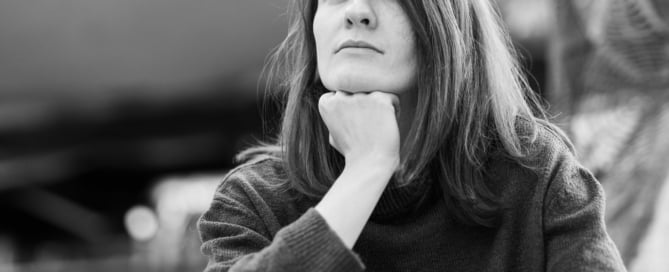 black and white image, woman thinking